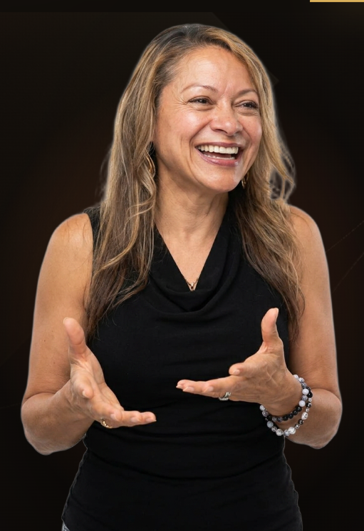 LaShena laughing warmly, hands mid-gesture